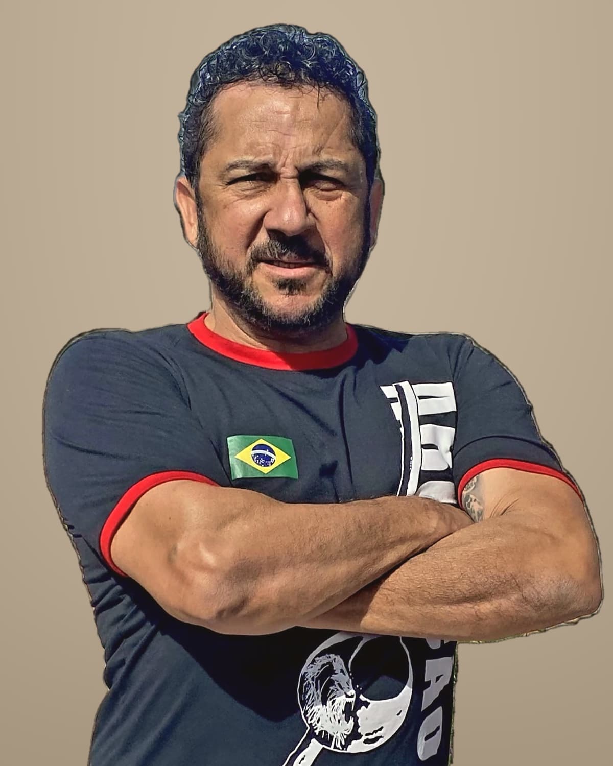 Mestrando Alec “Jabu” Dasilva with his arms crossed